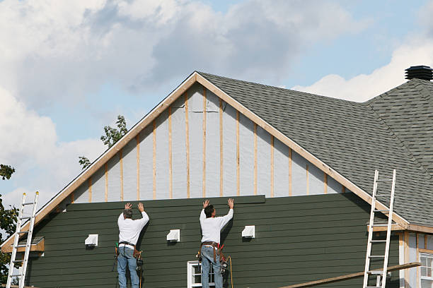 Professional Siding Contractor technician working in Summerhill, PA